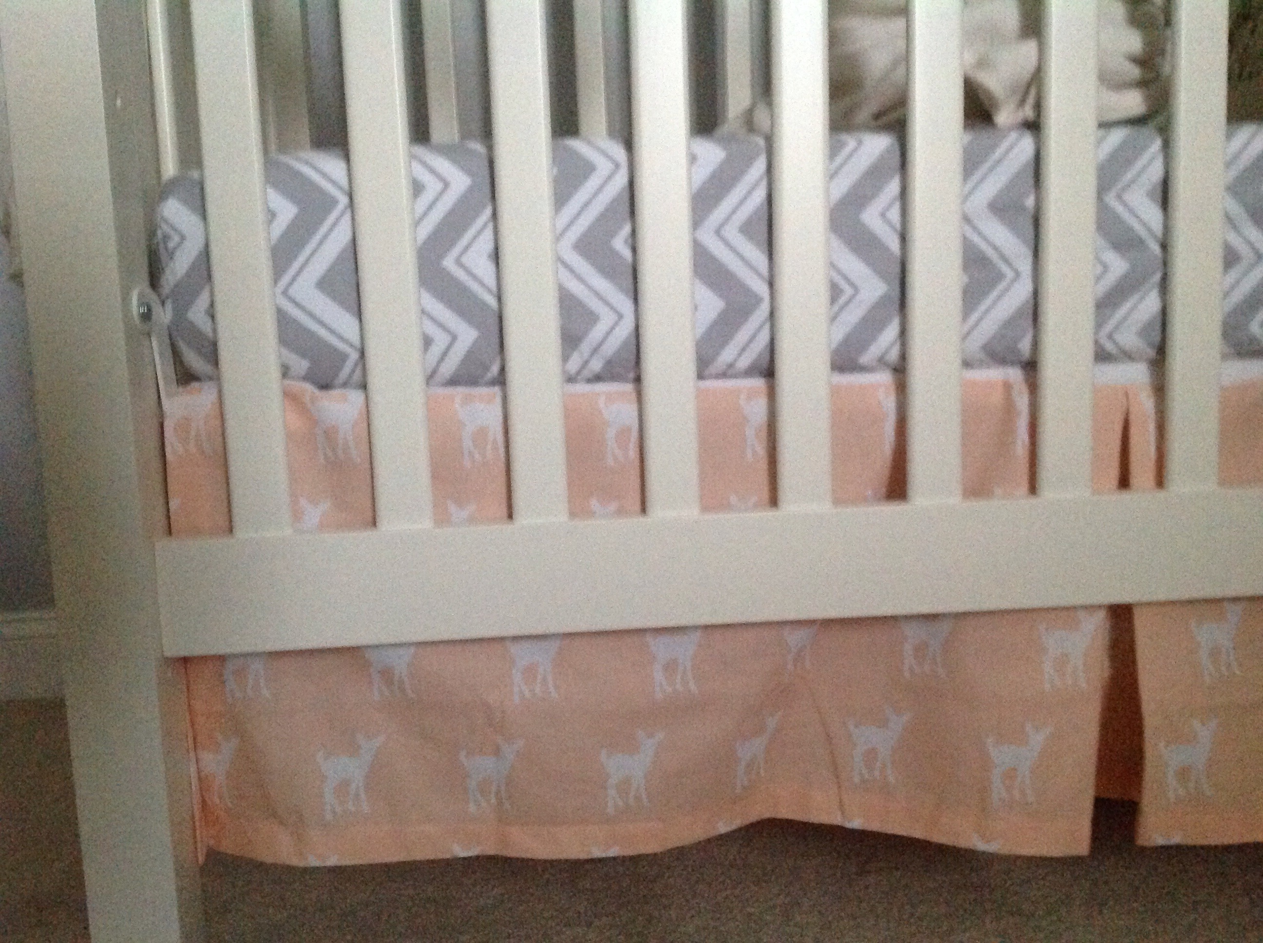 Peach Fawns Crib Skirt in this Woodland Nursery