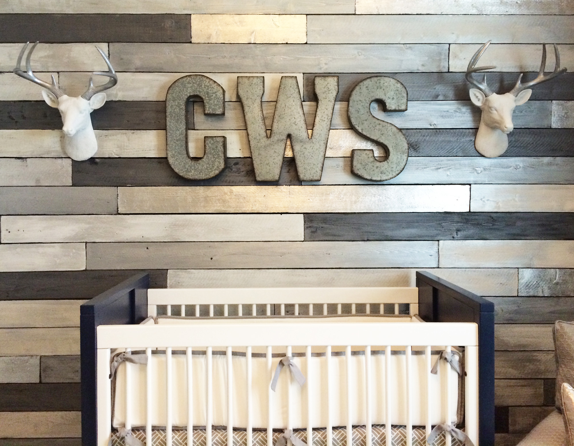 Metallic Wood Pallet Wall in this Boy Nursery