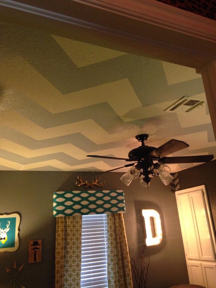 Chevron Ceiling in this Rustic Nursery