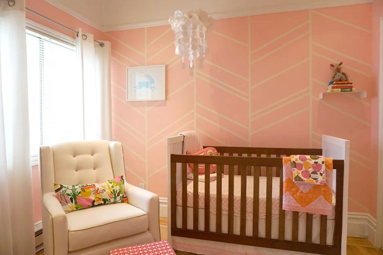 Herringbone Accent Wall in Pink Nursery - Project Nursery