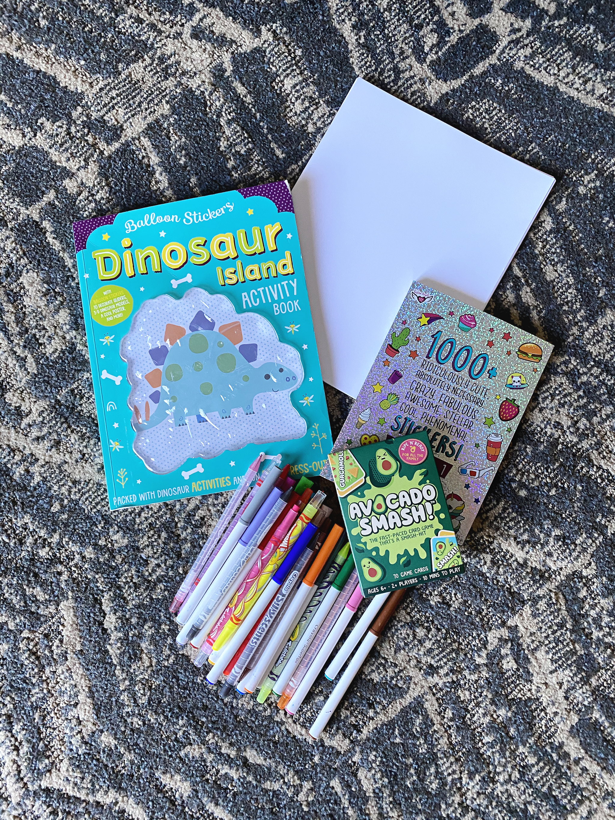 Activity books, card games, paper, and stickers are the best!